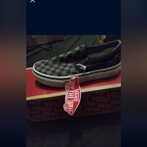 Vans unisex kids Black Checkered Slip-On Shoes